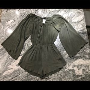 Green long sleeved romper